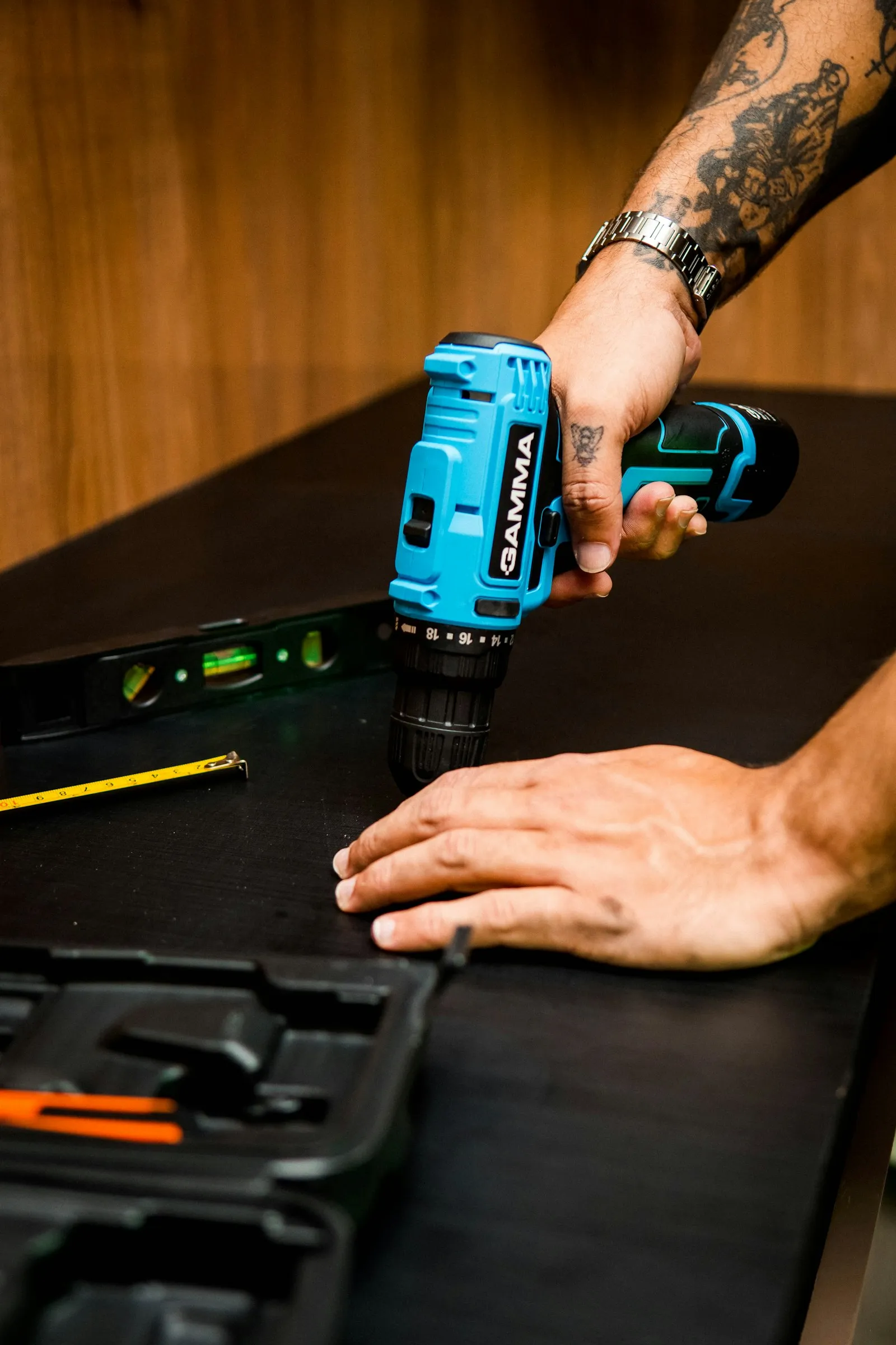 Person holding a blue cordless tool — Harbor Freight's Bauer 20V budget platform
