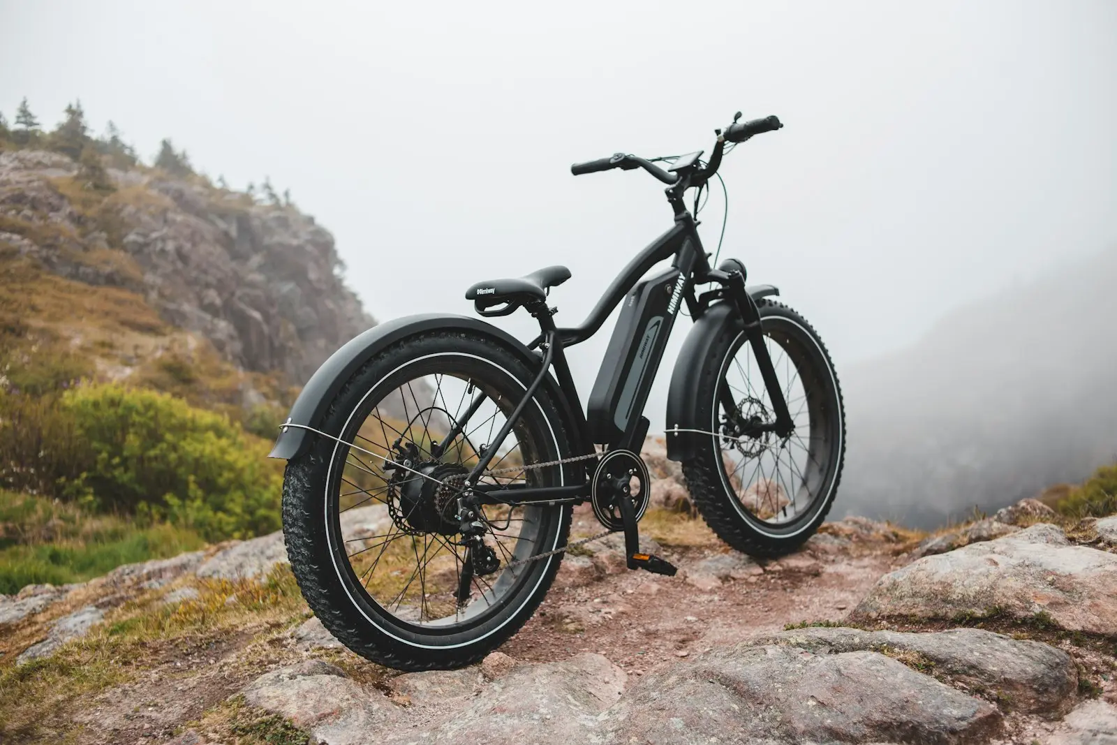 Black and gray mountain bike on dirt — bicycle horn install context