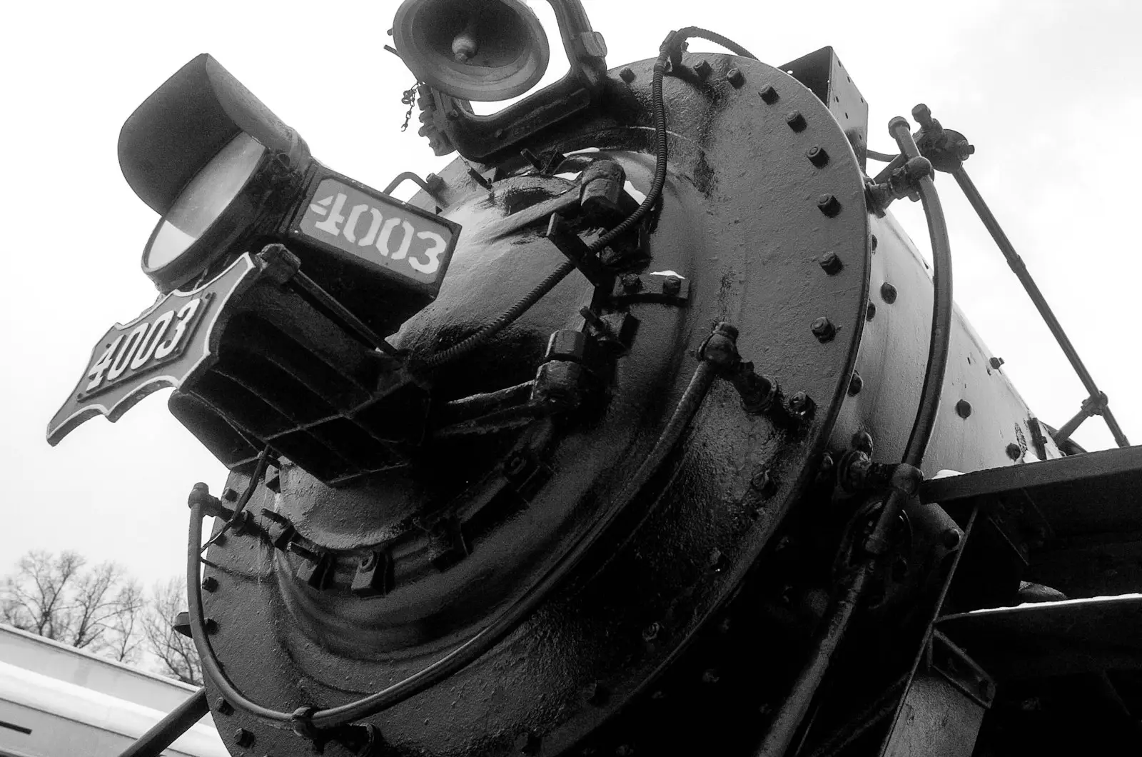 Close-up of a vintage steam train's front