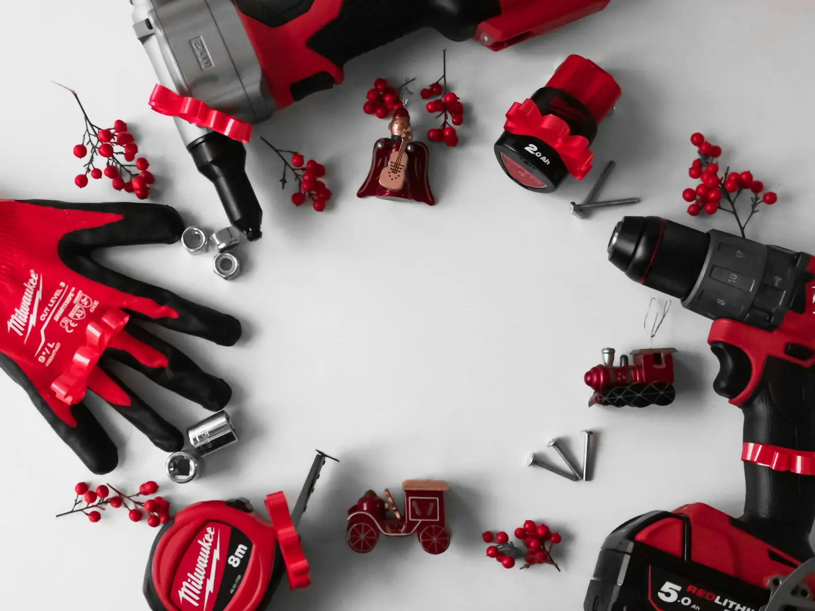 Red and black tools laid out — Craftsman V20 platform shared with Lowe's-line tools