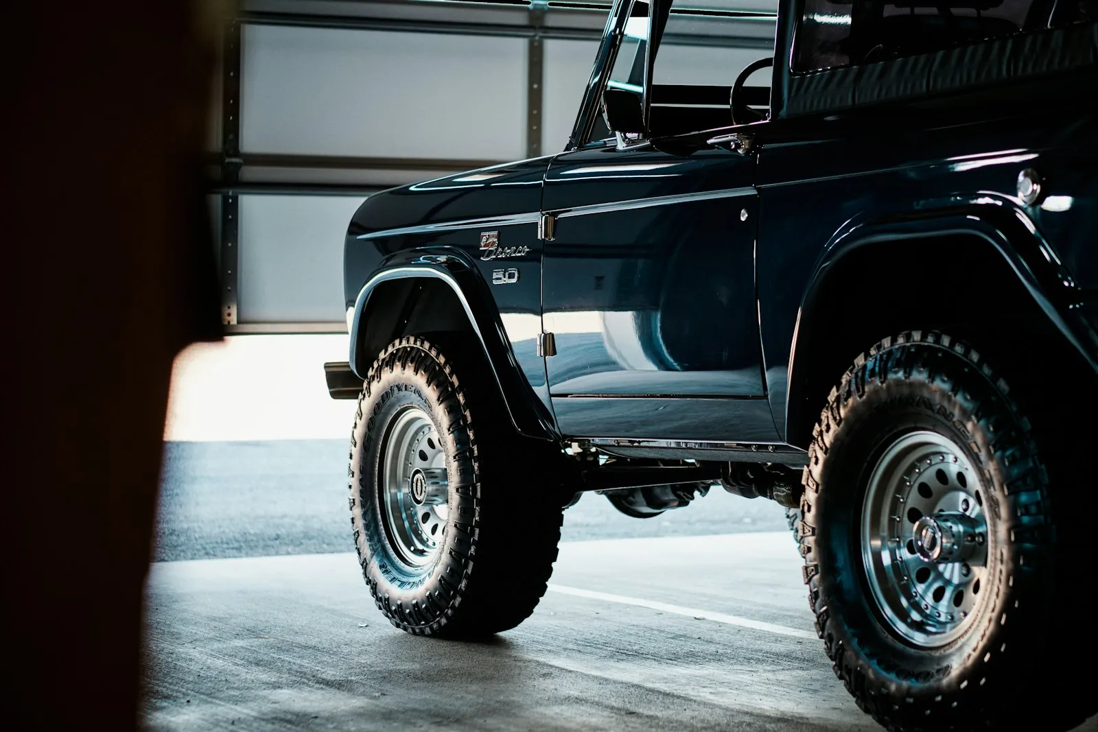 Blue Ford Bronco in a parking lot — Bronco off-road SUV install context