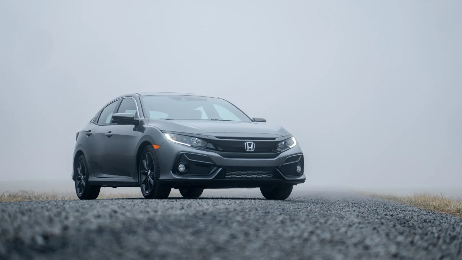 Gray Honda Civic sedan parked on a road — Civic install context