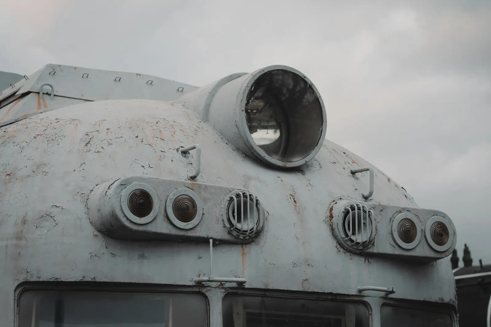 A close up of the front of an old train