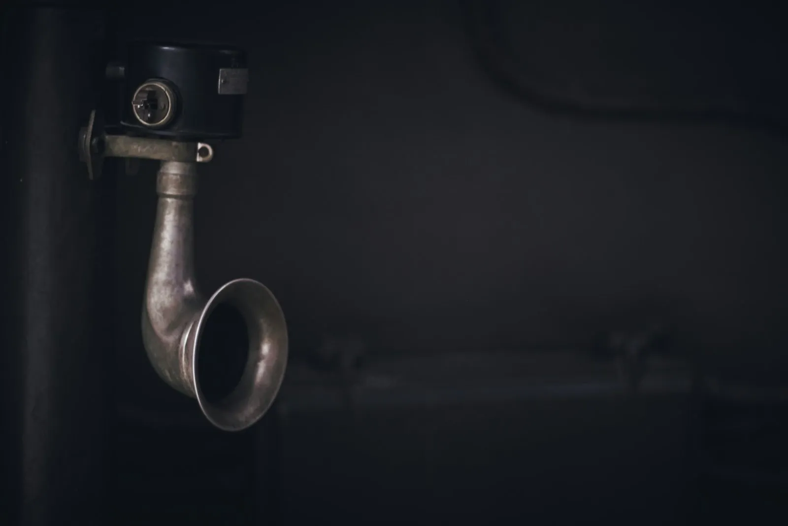 A close up of a pipe on a wall