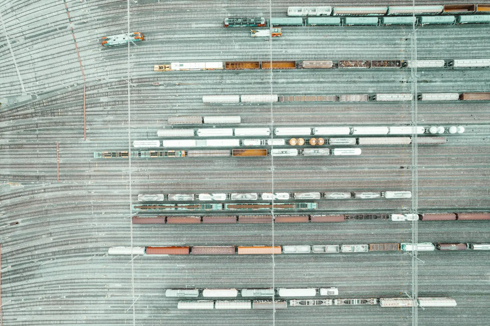 An aerial view of a train yard and tracks