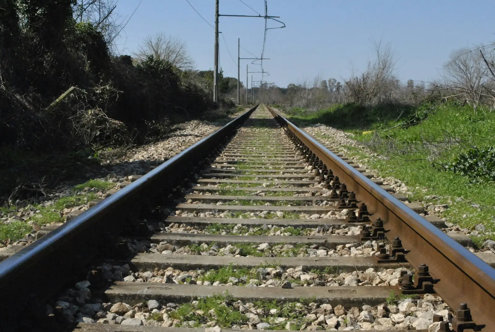 A train track with a sky in the background