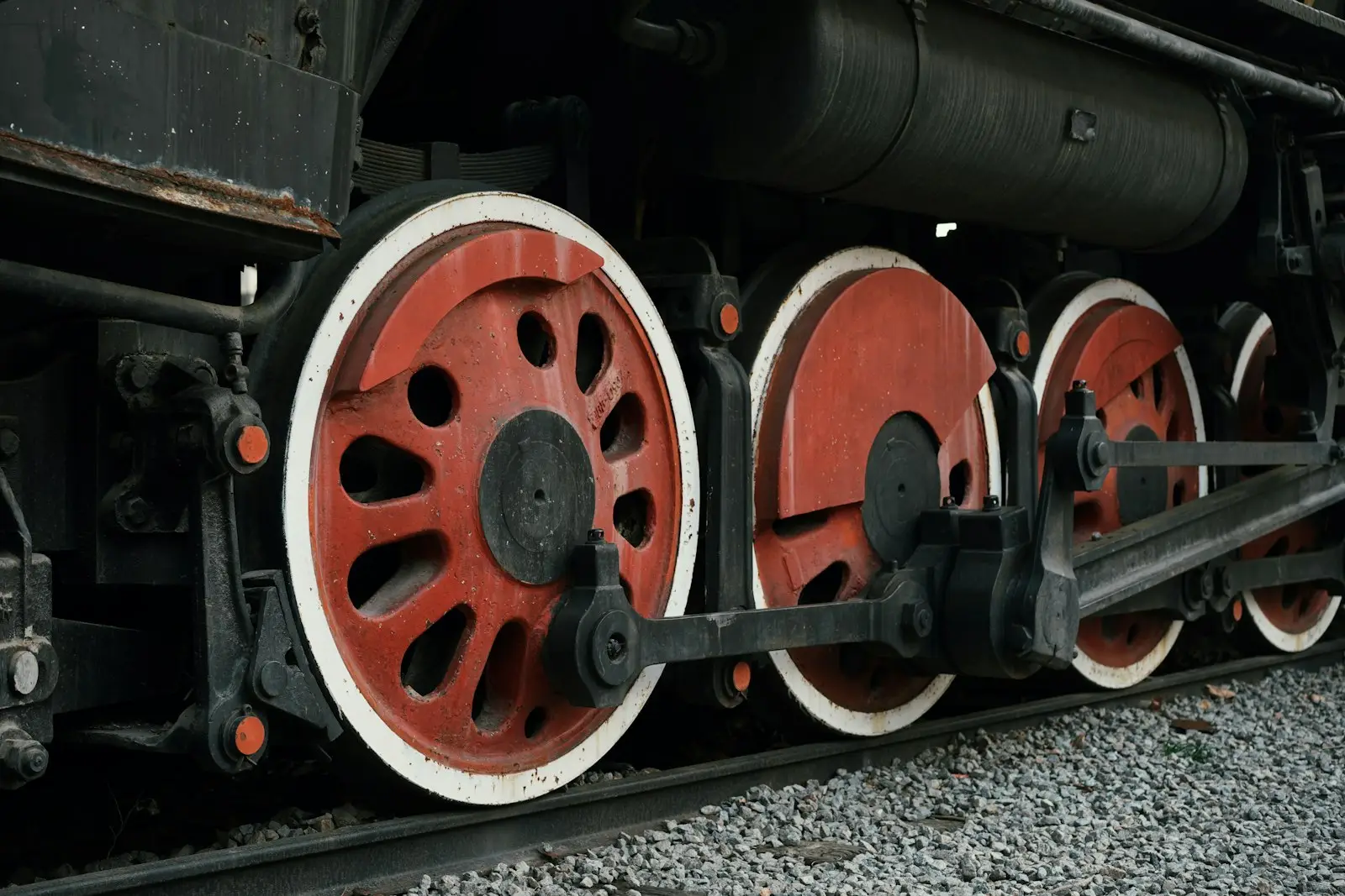 A close up of the wheels of a train