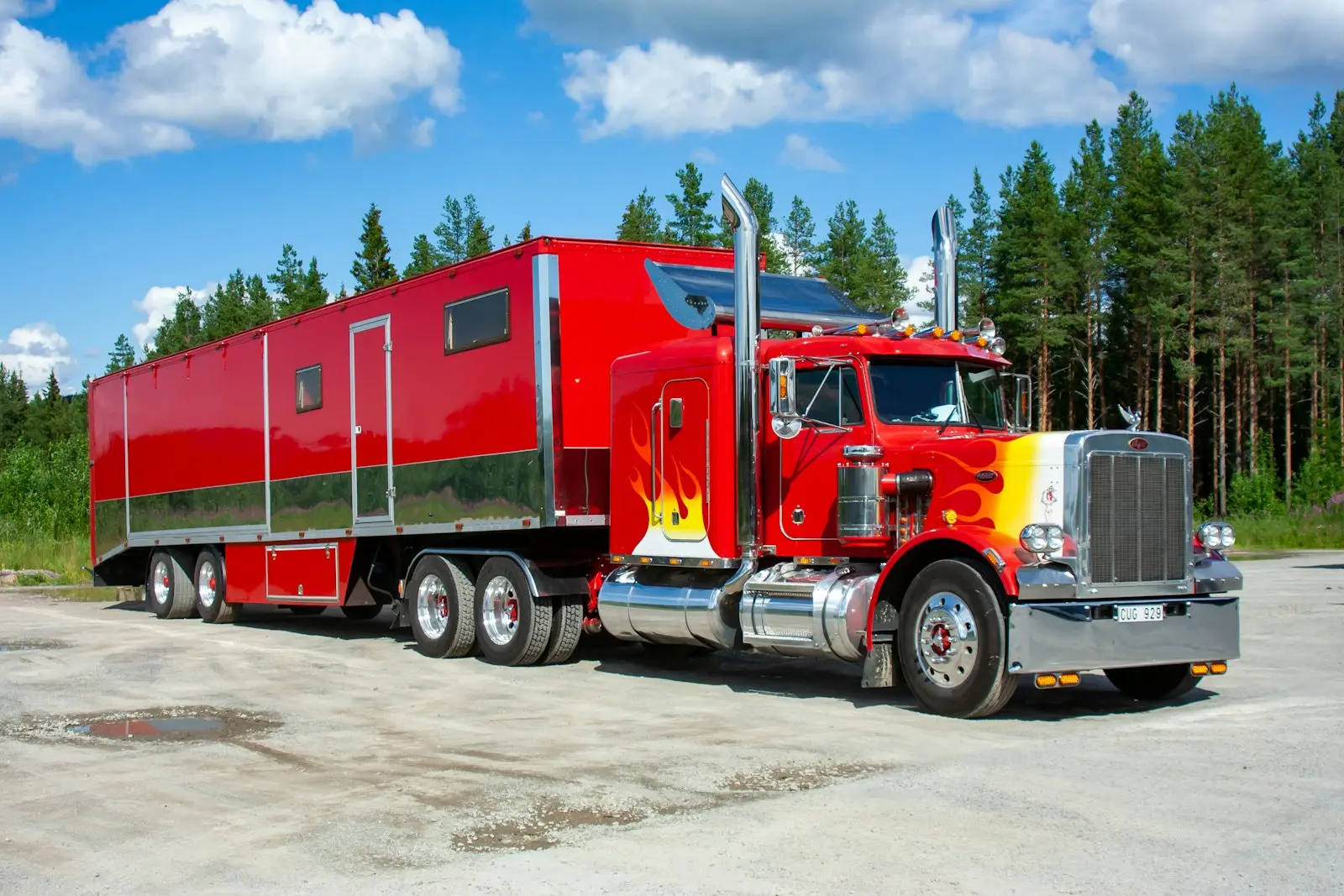 Red and white Peterbilt truck on the road — Peterbilt 379 cab-roof install context
