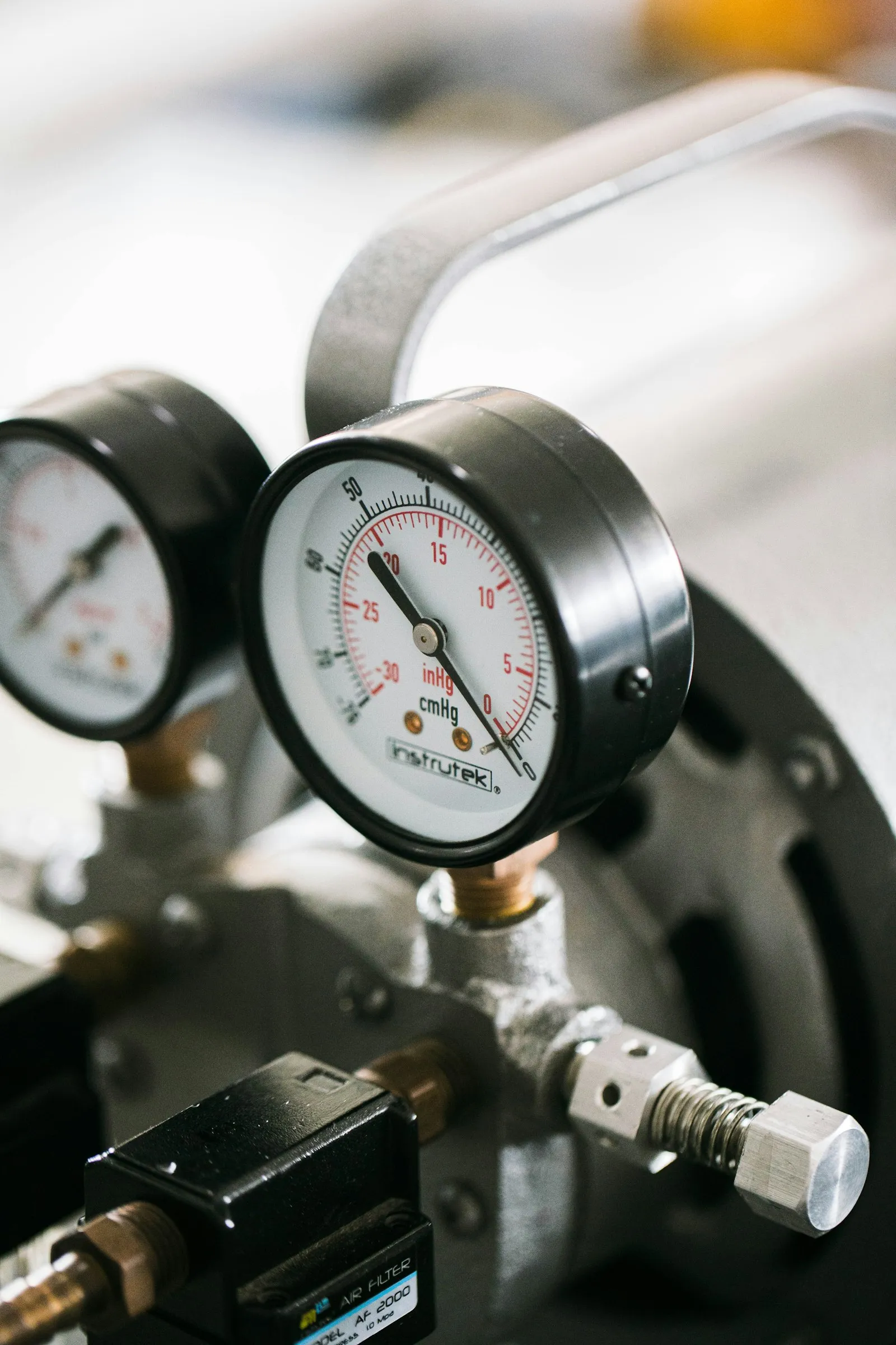 Close-up of a pressure gauge on a machine — PSI measurement context