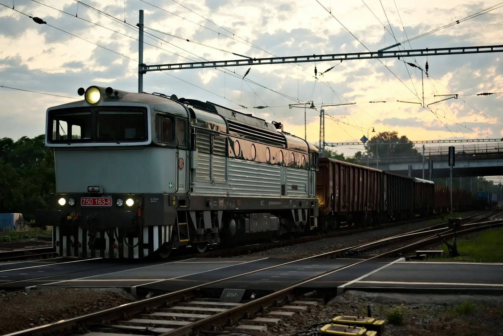 Red and blue train on rail tracks
