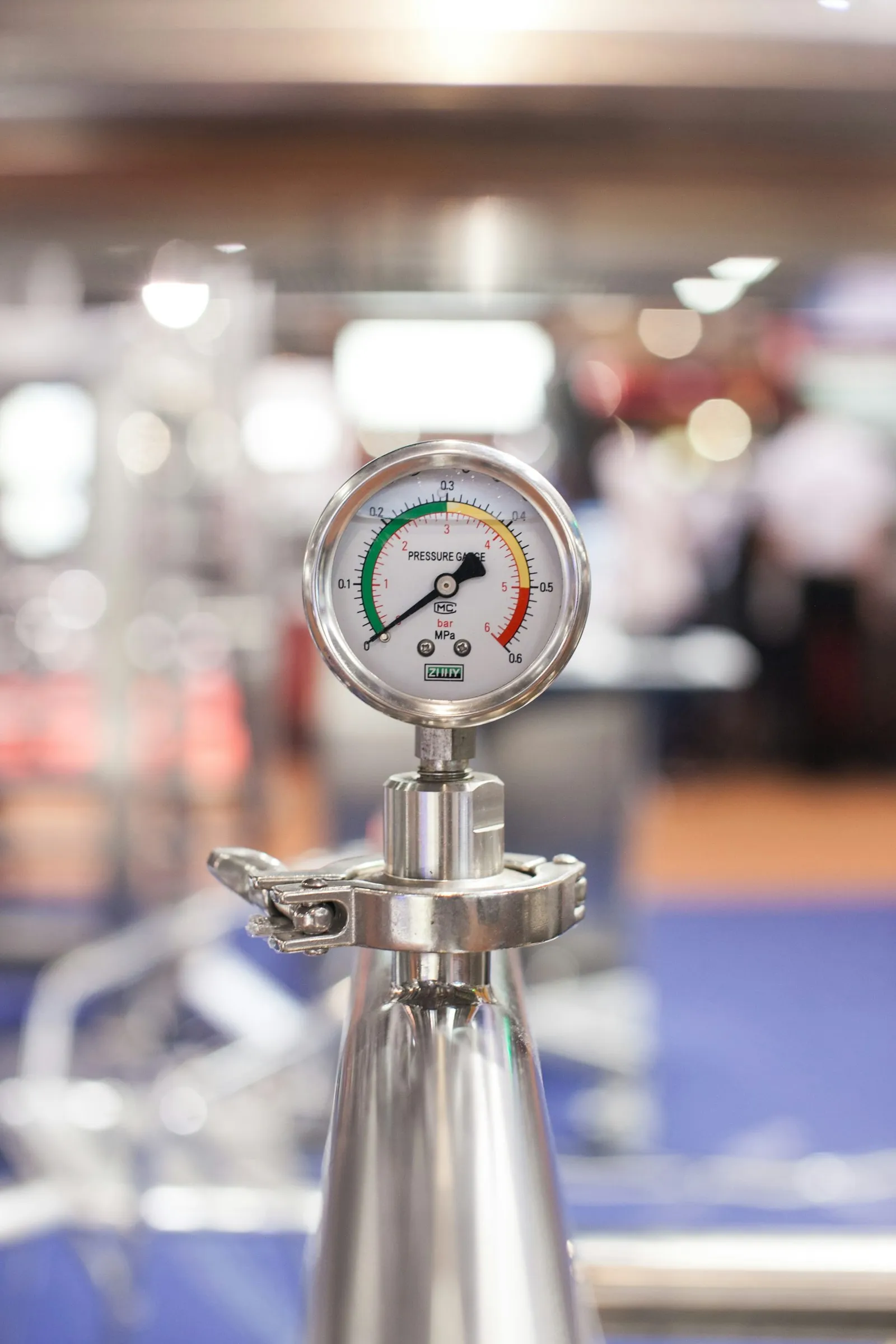 Selective focus photography of a gauge — the kind of analog SPL meter dB measurements come from