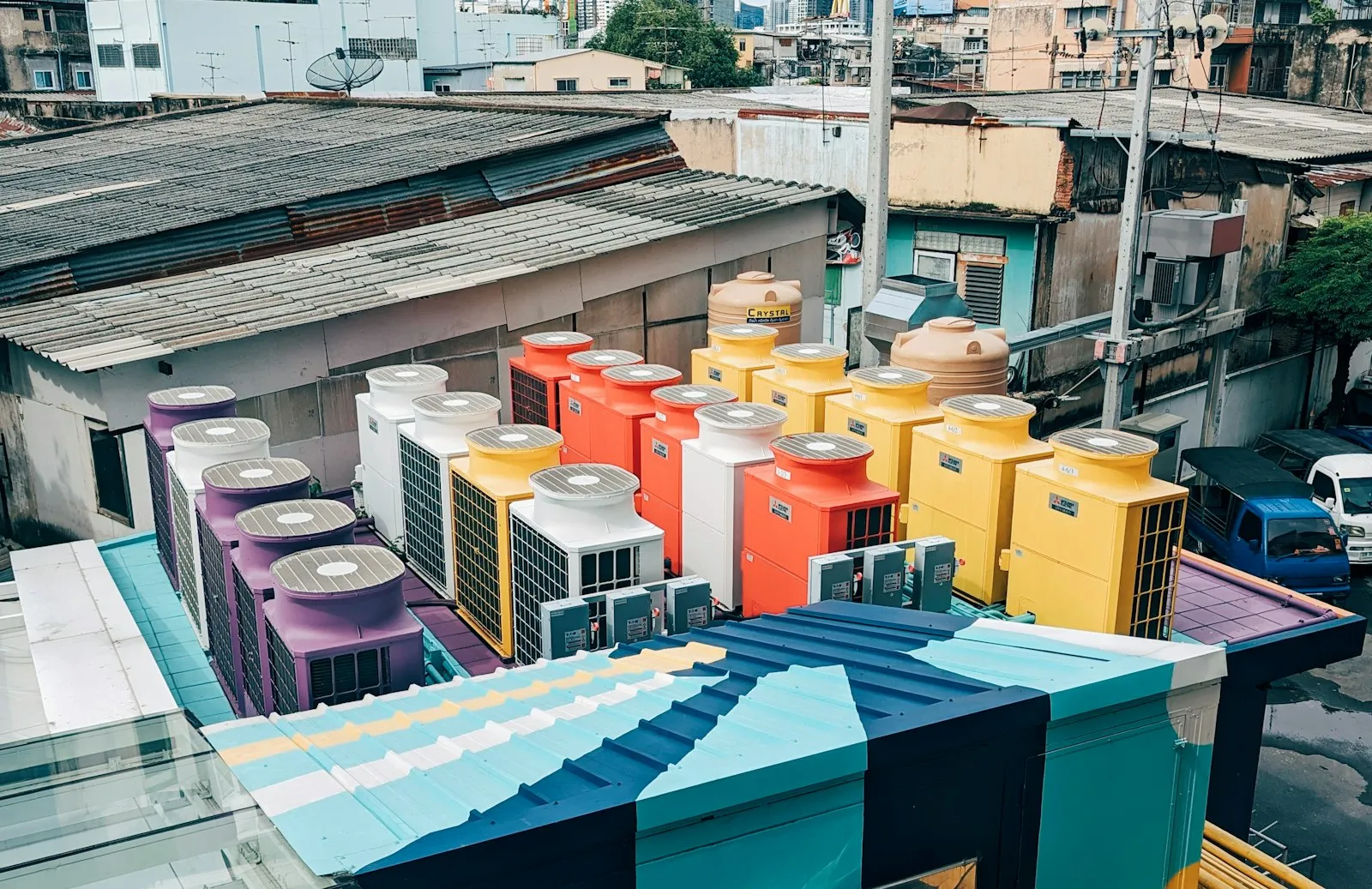 A bunch of colorful boxes sitting on top of a roof