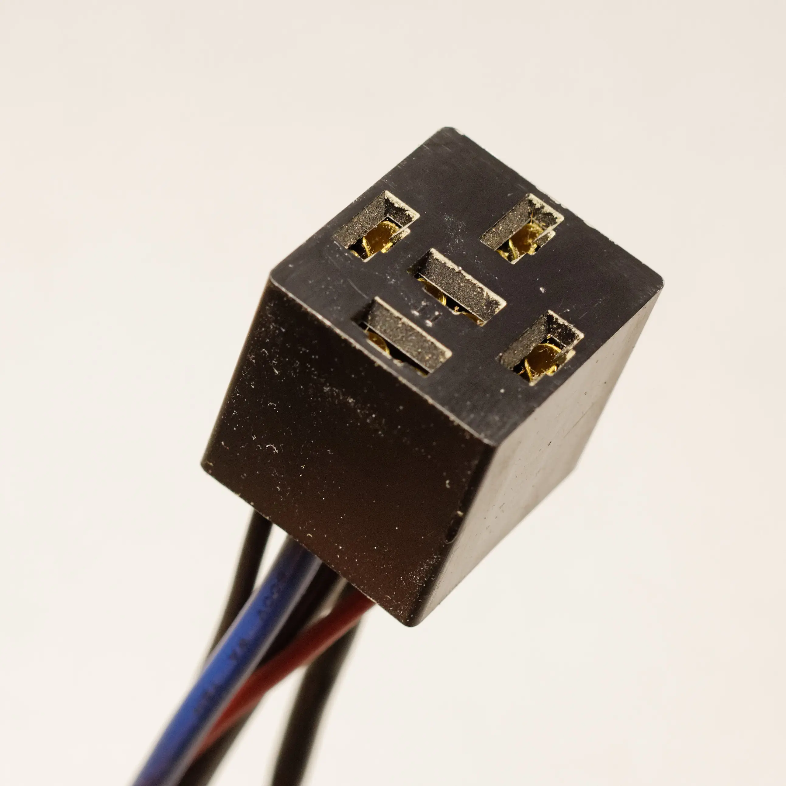 Automotive relay socket with wiring, the kind used to trigger a train horn from a factory horn circuit