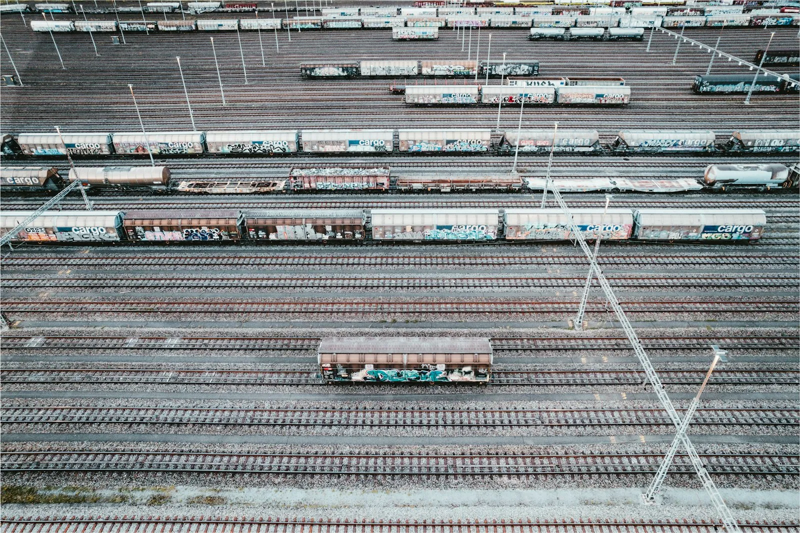 A train yard filled with lots of train cars