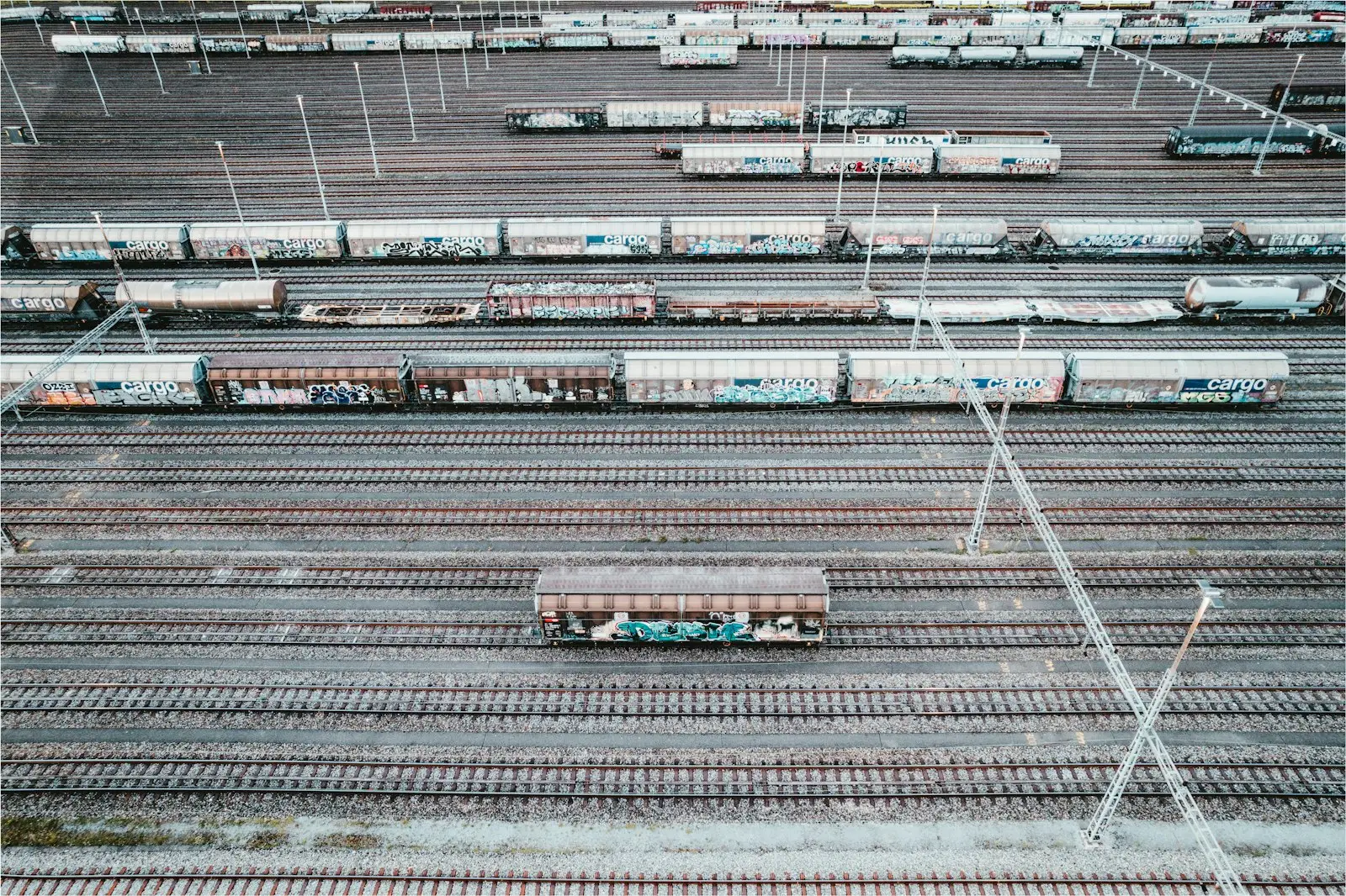 A train yard filled with lots of train cars