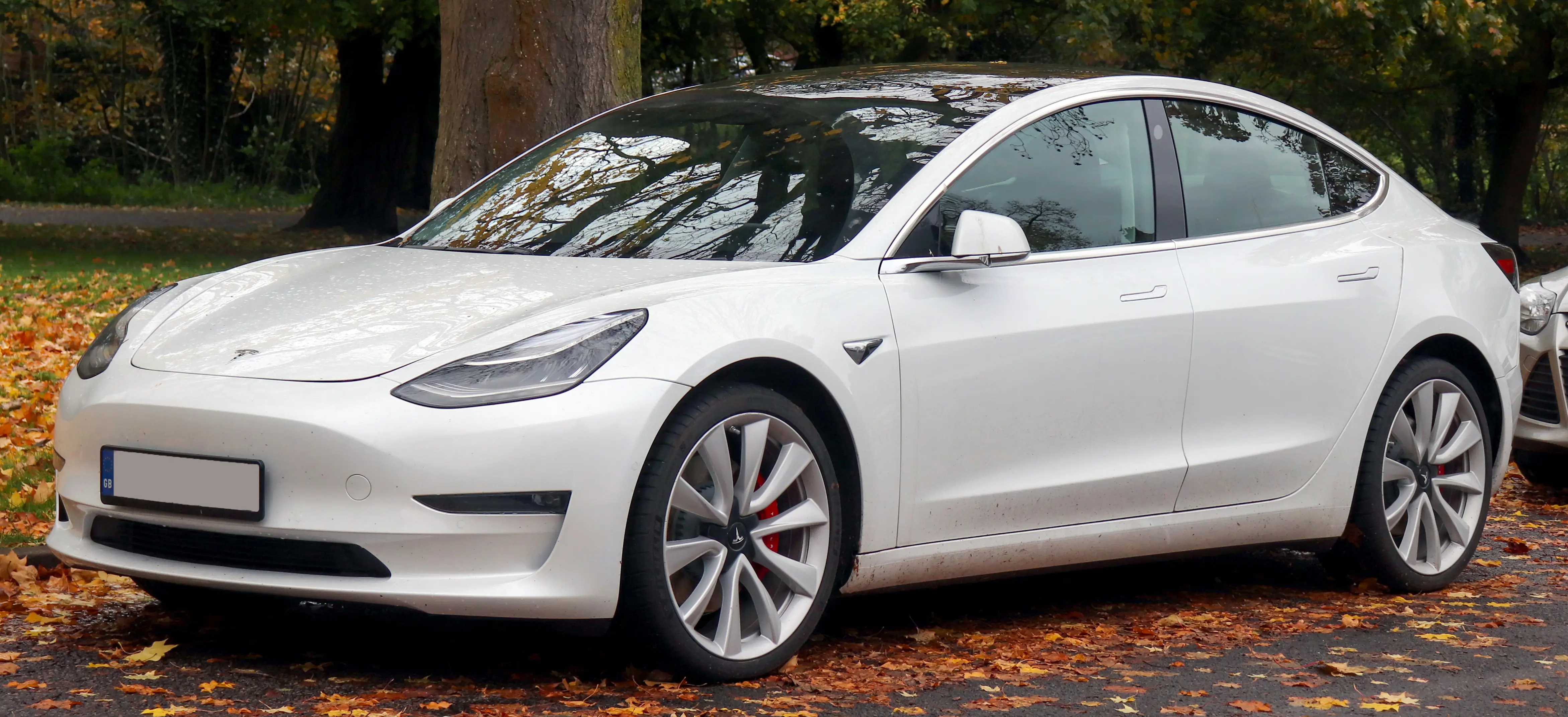 Front end of a 2019 Tesla Model 3, whose frunk area houses the low-voltage battery used to power a train horn install