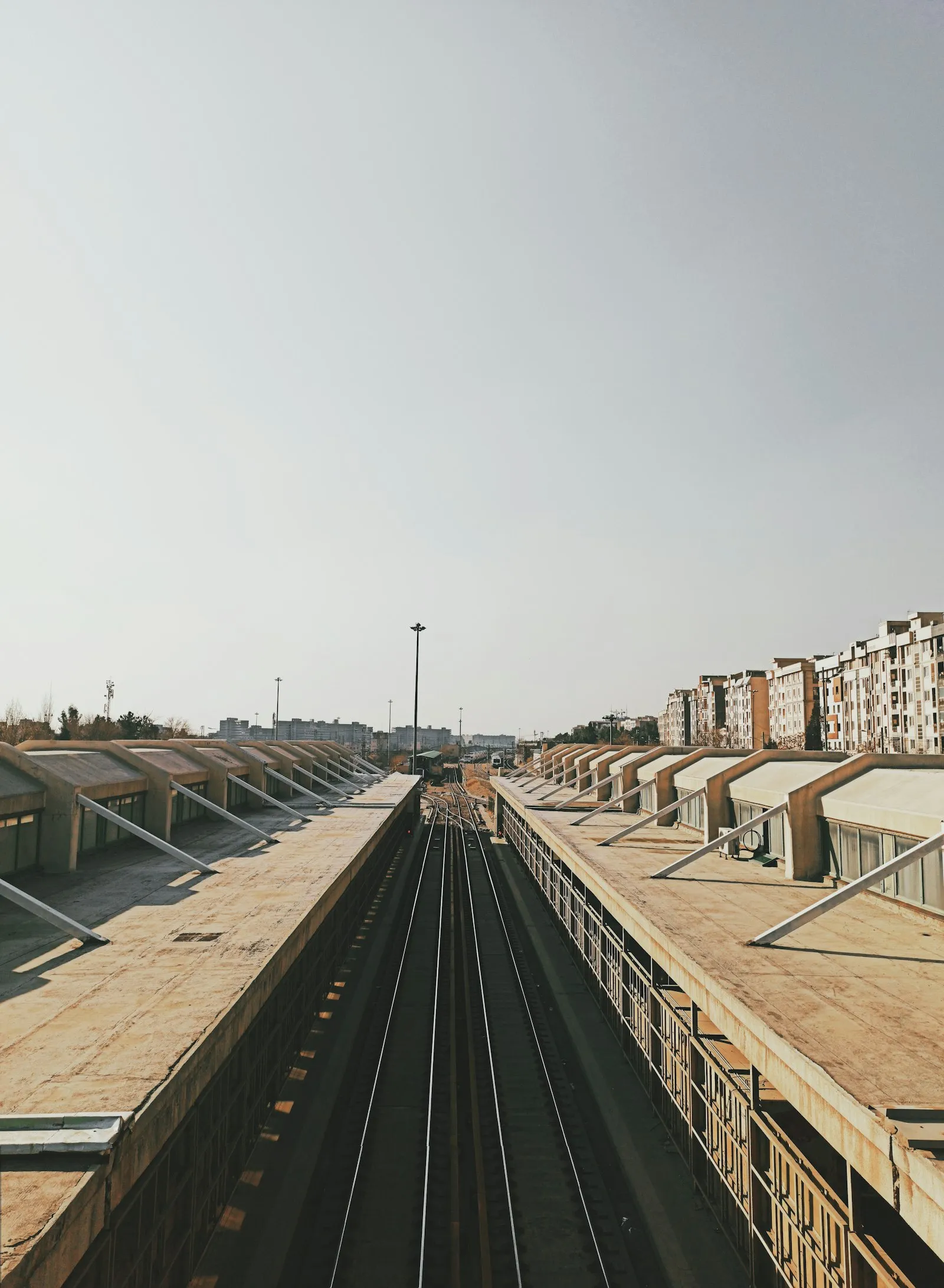Train station with a train on tracks — Salt Lake's UTA FrontRunner / TRAX hub