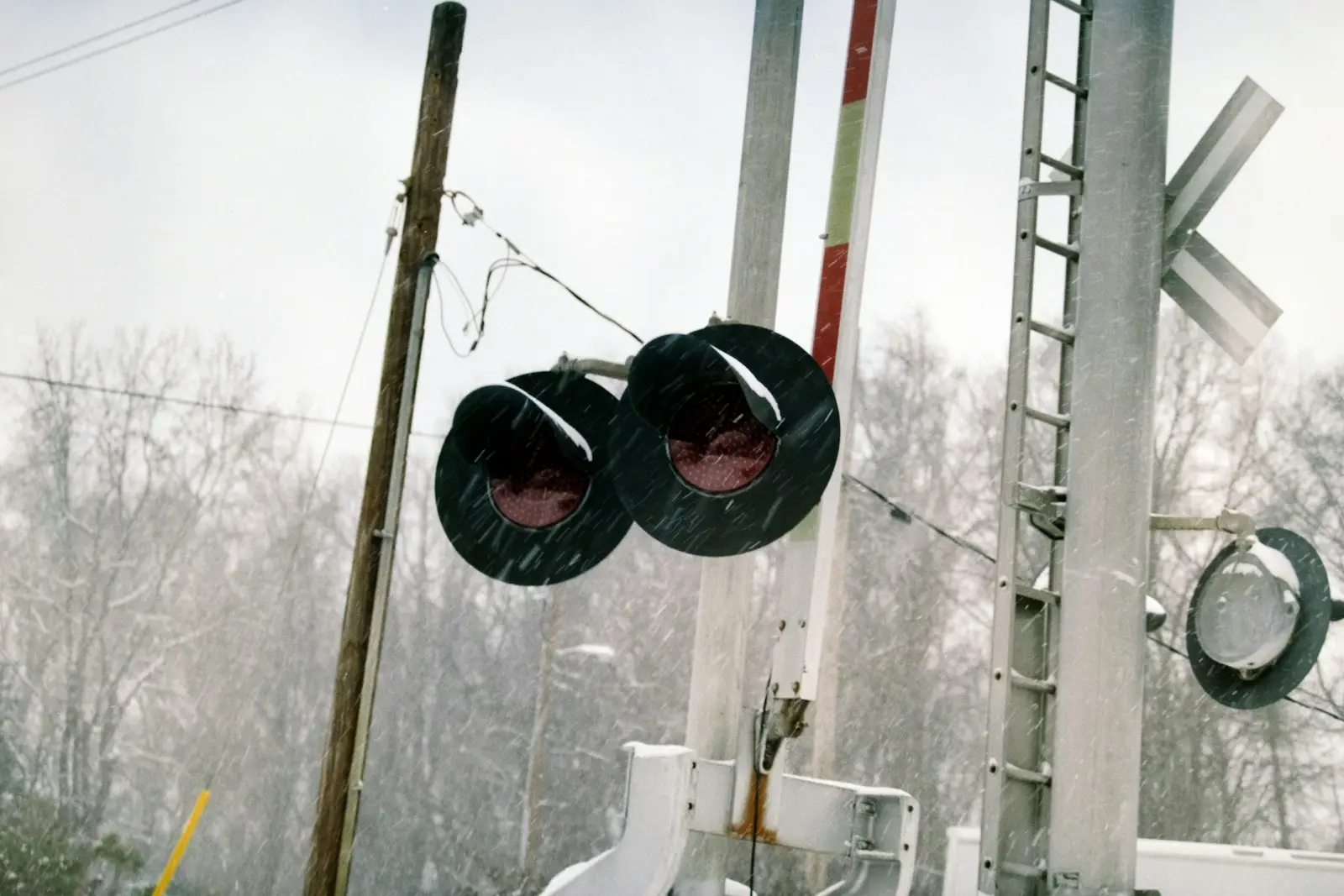Railroad crossing signals in the snow