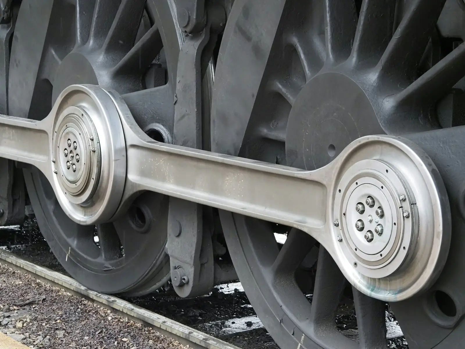 A close up of the wheels of a train