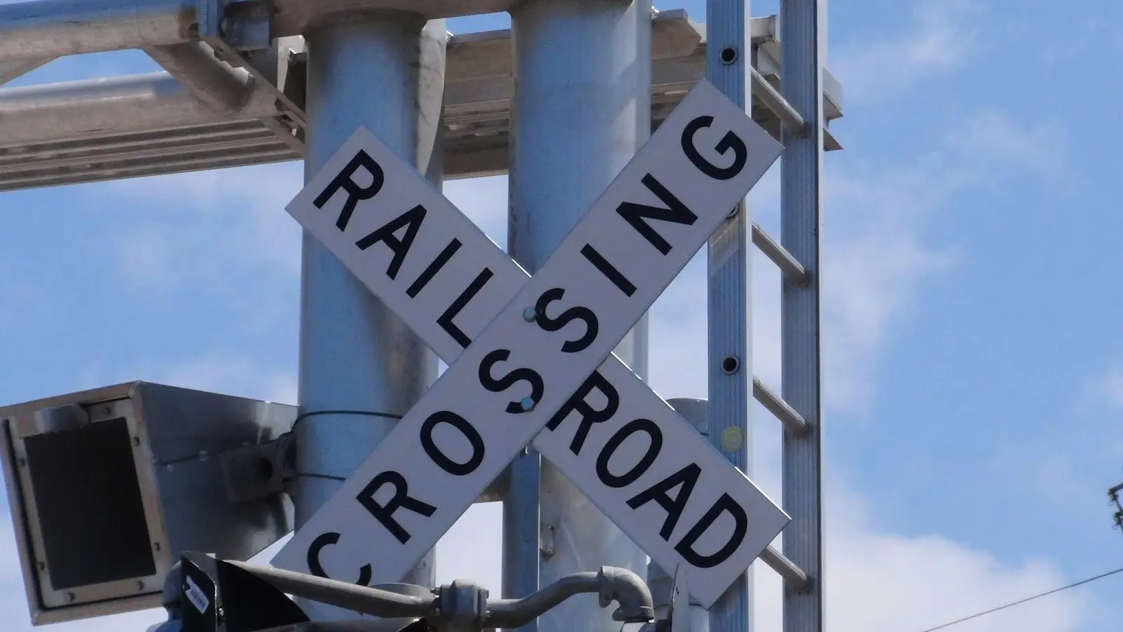 White and black metal signage