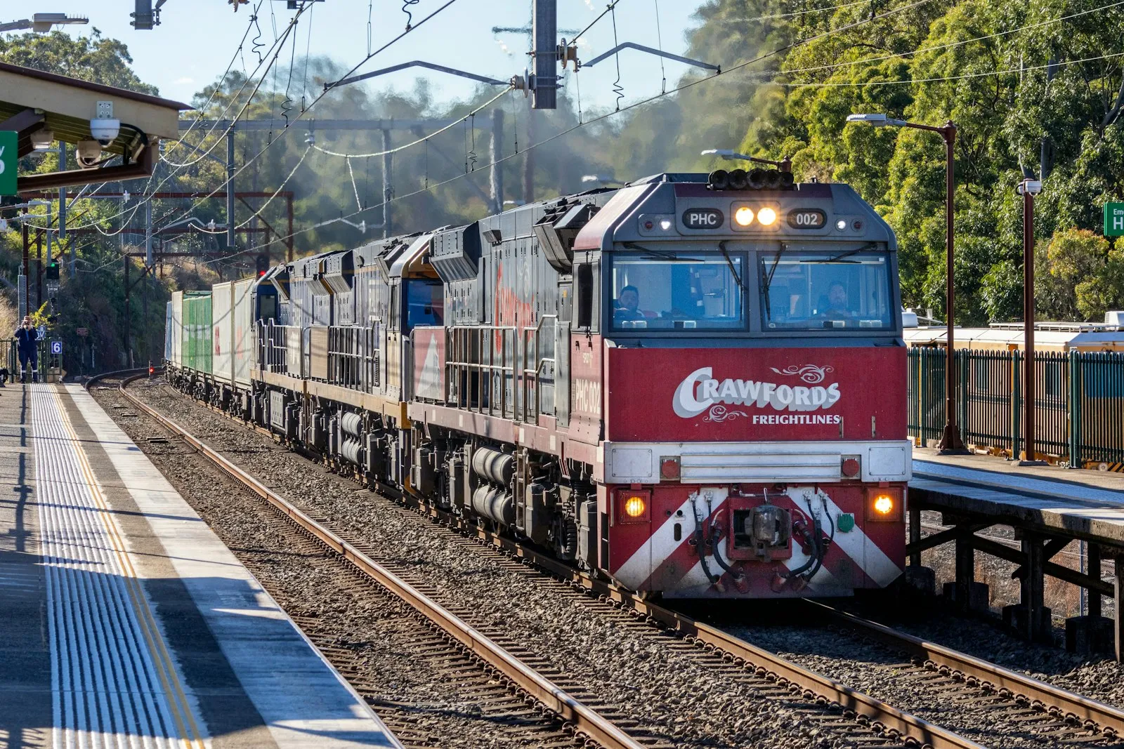 The No. 4190 Crawfords Intermodal train is seen passing Cowan train station.