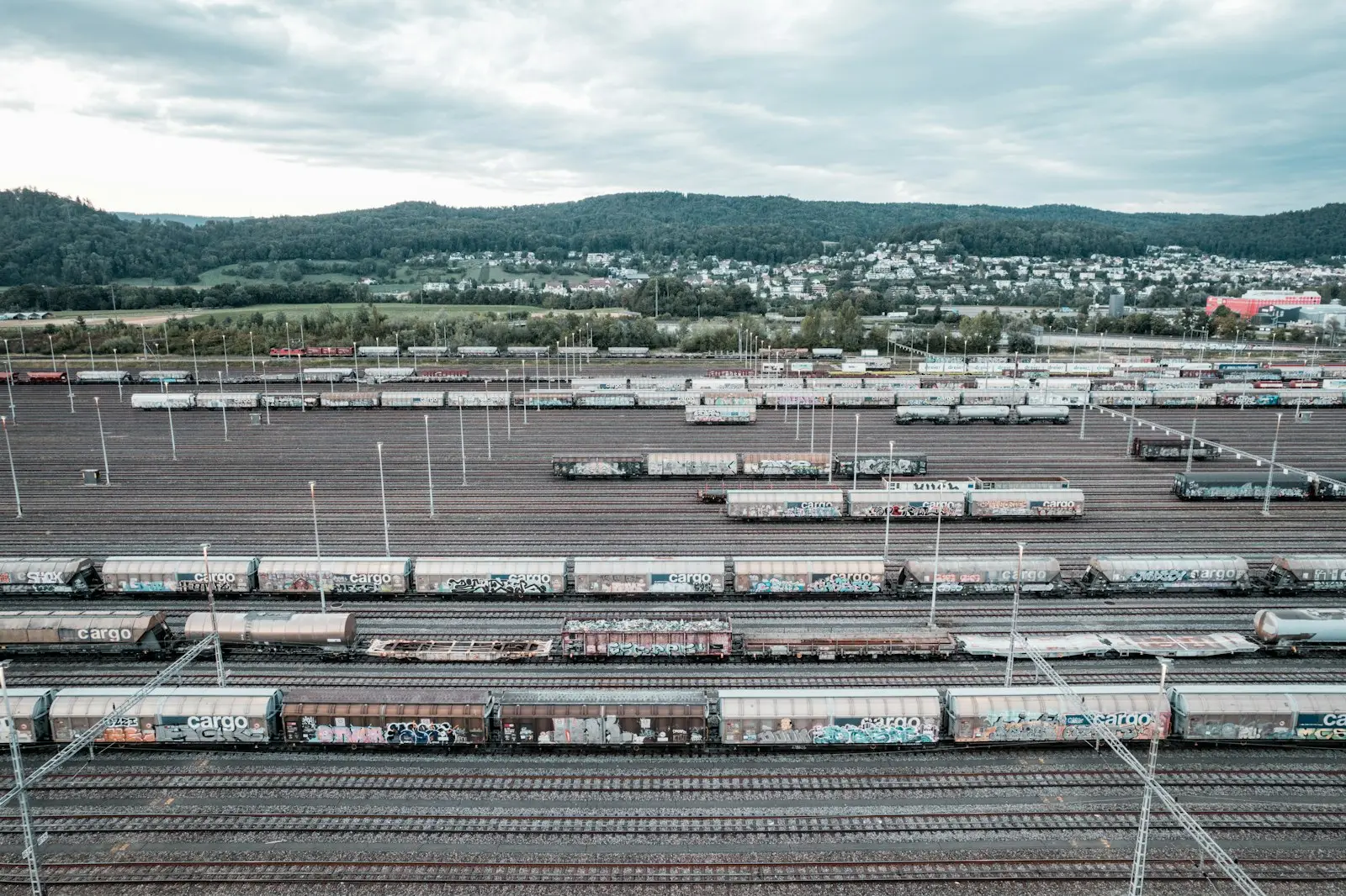 A train yard filled with lots of train cars