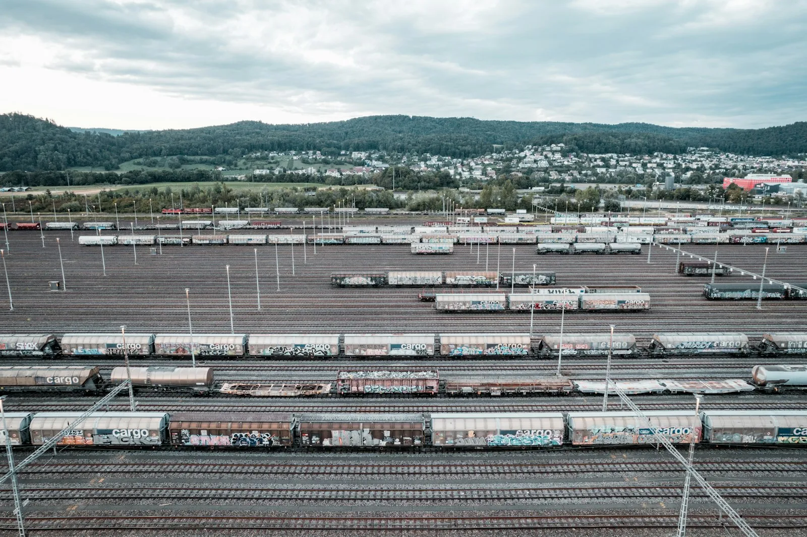 A train yard filled with lots of train cars