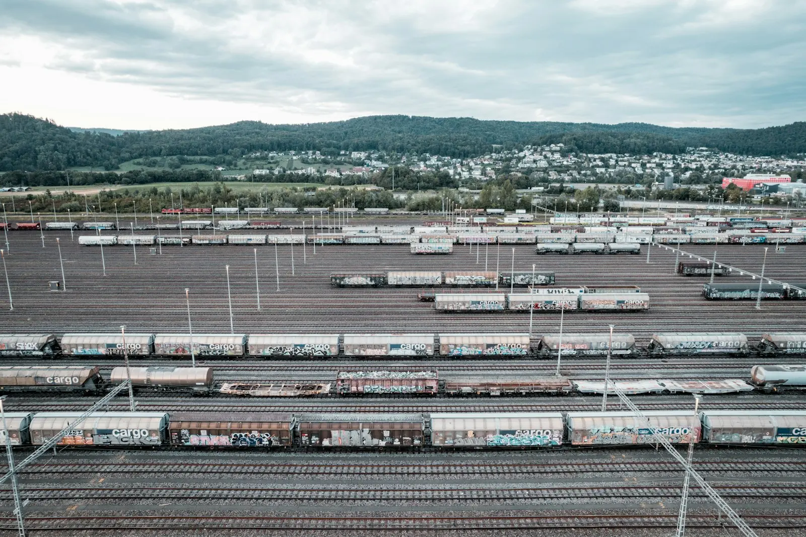 A train yard filled with lots of train cars