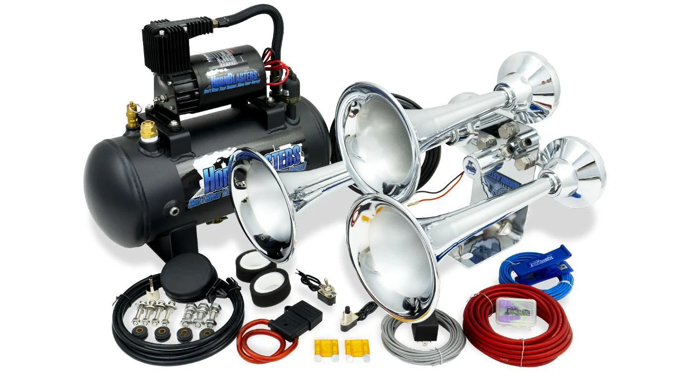 HornBlasters Mini Outlaw 127H chrome kit showing 2-liter compressor on 1.5-gallon tank, three chrome bells and wiring